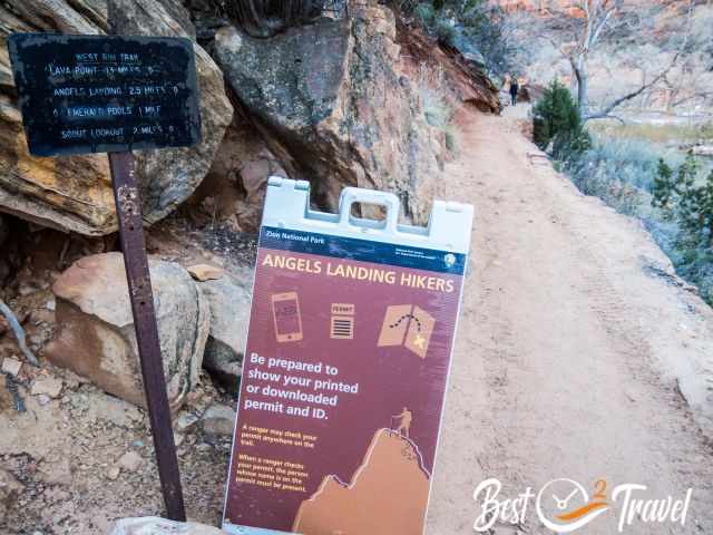 Hiking distance sign and reminder for the mandatory permit.