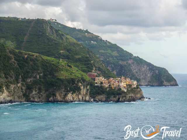 Manarola from the distance perched on the rocky outcrop.