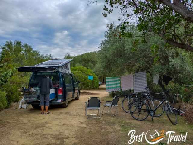 Campers at their open van at the nearby campground.