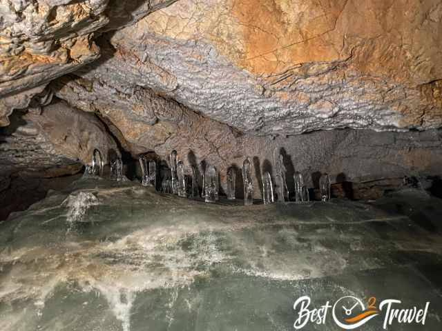 Ice stalagmites at the entrance to Wimur