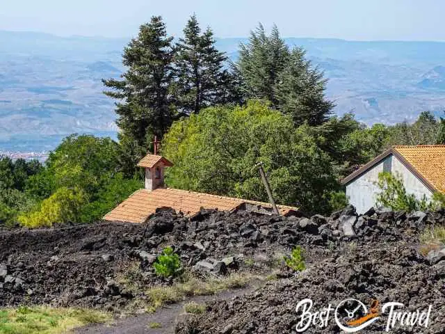 The chapel of a village was half buried under lava.