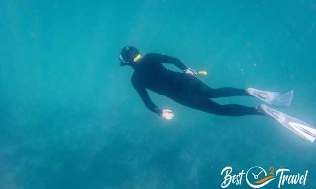 A free diver in the deep sea