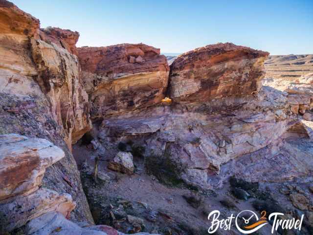 The massive wall with the hole leading to the Falling Man