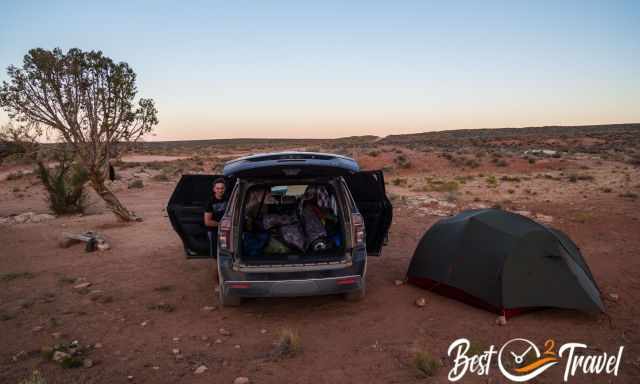 Our tent and car early morning next to Hole in the Rock Road