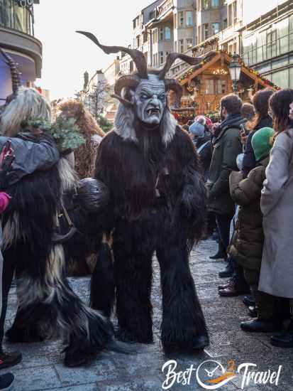 A huge Krampus with bent horns.