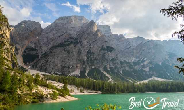 Lake Braies and visitors walking the circular trail