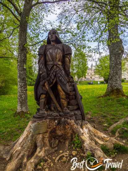 A wooden statue of a knight