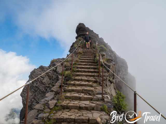 A hiker on the Stairway to Heaven in winter