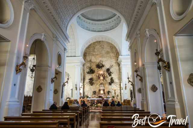 The church nave and the Madonna in the background