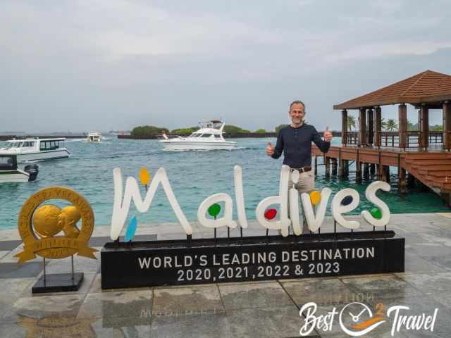 The colourful Maldives entrance sign at Velana airport.