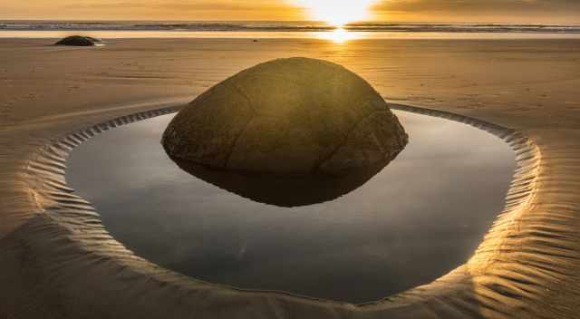 Moeraki Boulder shimmering during sunrise