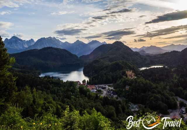 Castle Hohenschwangau with Alpsee and Allgäu Alps at sunset