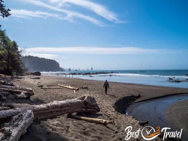 A hiker on Third Beach after the creek crossing.