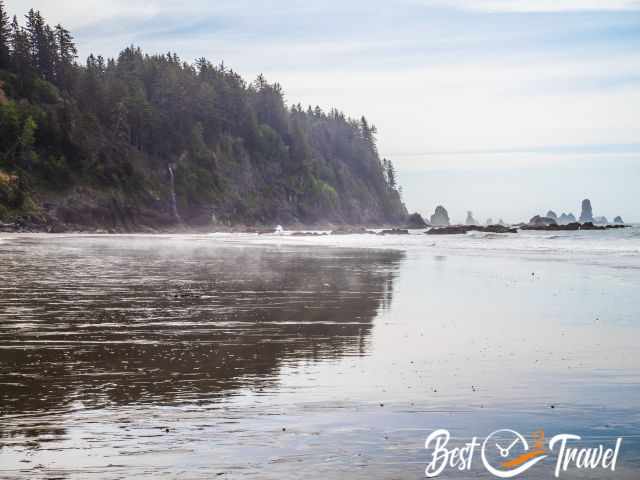 The empty Third Beach and waterfall at the end