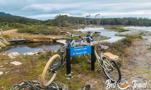 Two bikes leaning at the Painted Cliffs sign