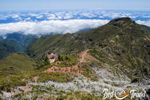 The mountain hut nestled in a breathtaking landscape.