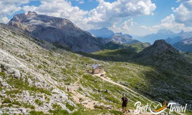 Hikers on the path to Refugio Biella nestled in the Dolomites