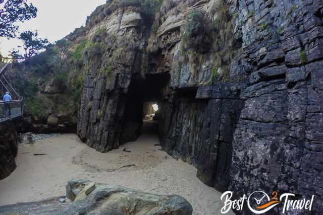 The dry sand in front of the Remarkable Cave at low tide.