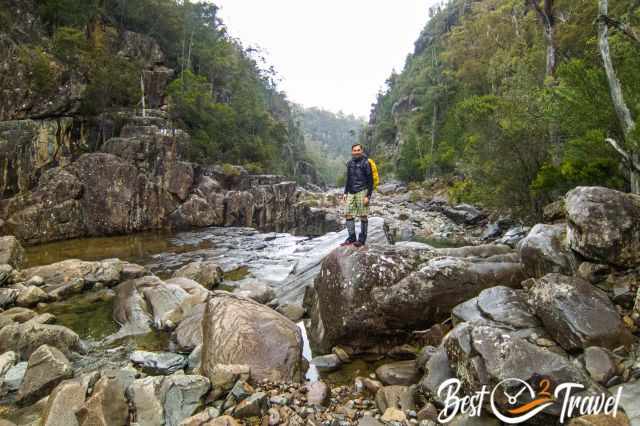 A hiker on a huge rock in the Apsley River Gorge