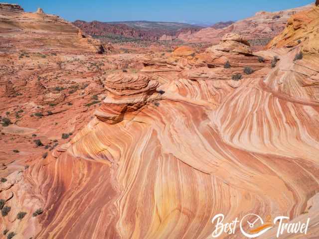 More orange and reddish sandstone formations.