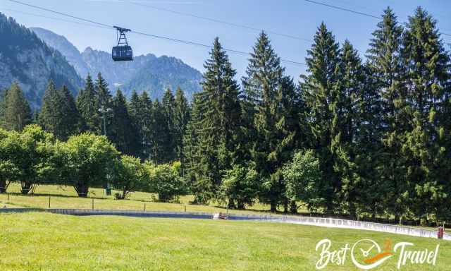 The summer alpine coaster and the cable car above