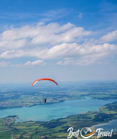 A paraglider above Lake Foggensee