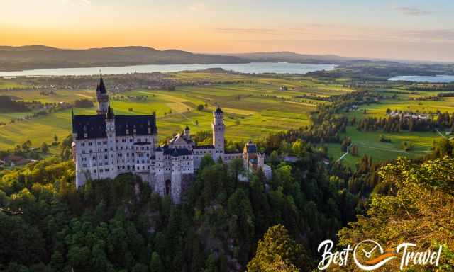 Neuschwanstein from higher elevation at sunset