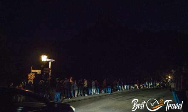 The crowded bridge in front of Kofel at night